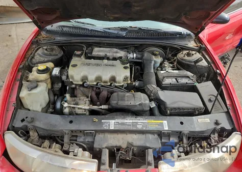 1999 Saturn Sc1 z USA, uszkodzony, nr VIN 1G8ZP1287XZ243932